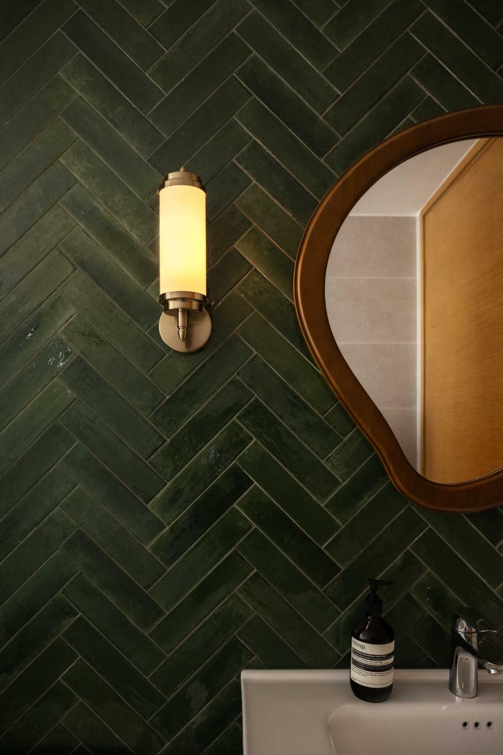 Contemporary Bathroom with Herringbone Tiling and Mirror