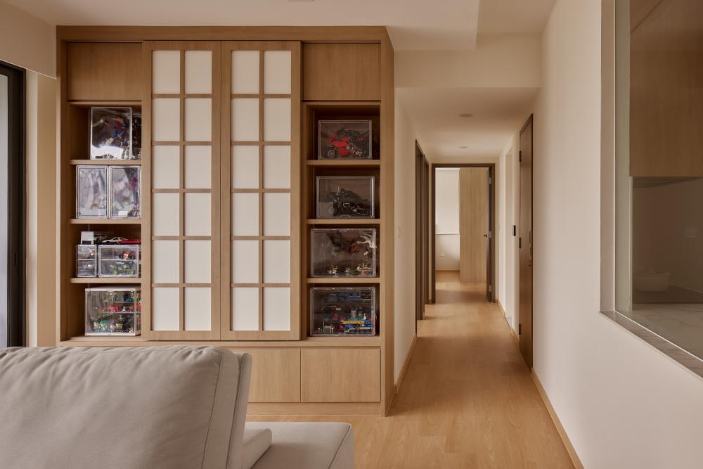 Asian Hallway with Wood Flooring and Display Cabinets