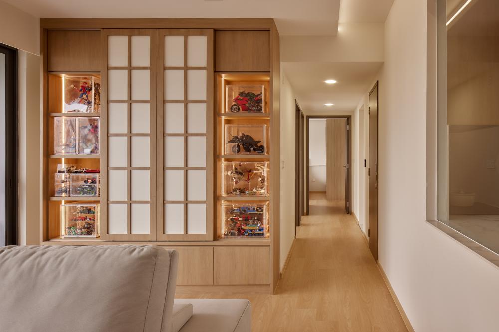 Asian Hallway with Wood Flooring and Display Cabinets