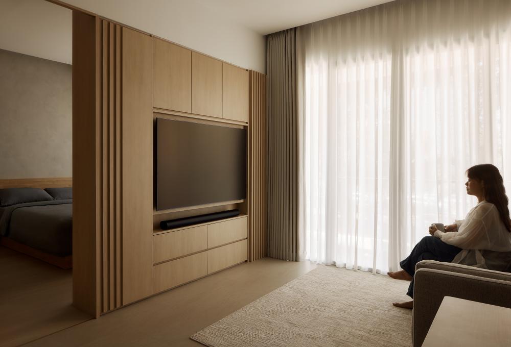 Asian Living Room with Wood Flooring and TV Console