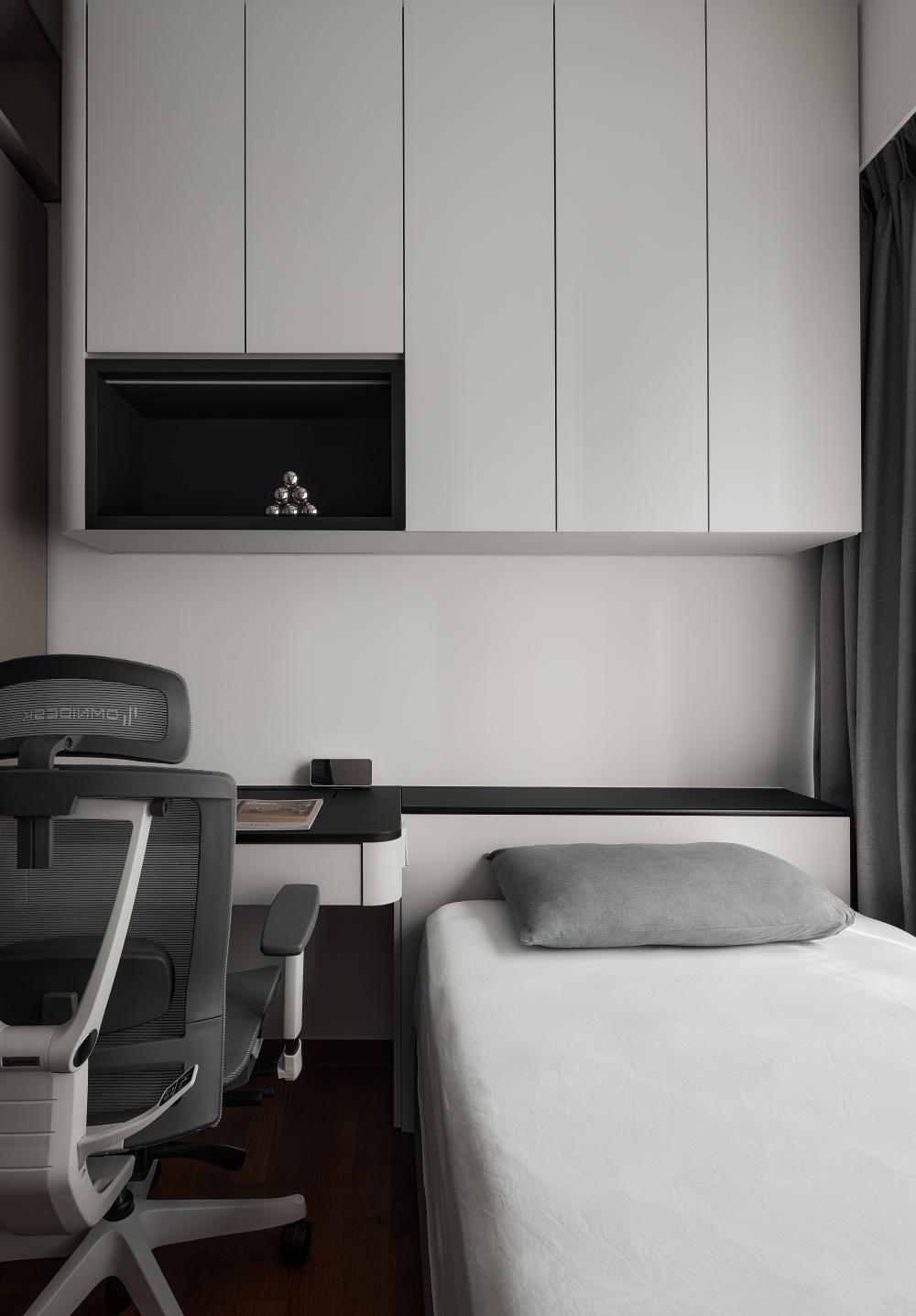 Modern Bedroom with Bedside Table and Desk Chairs