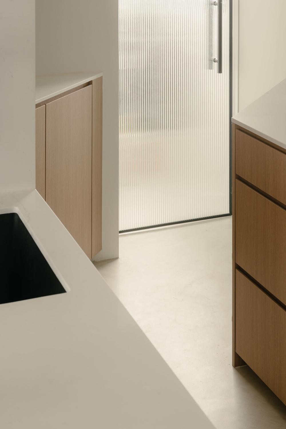 Modern Kitchen with Countertop and Cement Floor