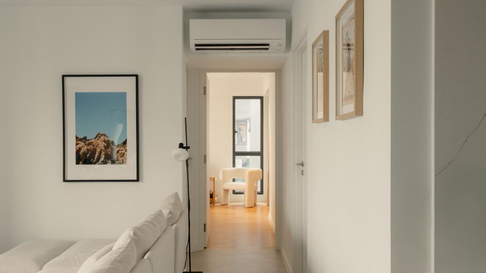 Modern Hallway with Artwork and Paintings