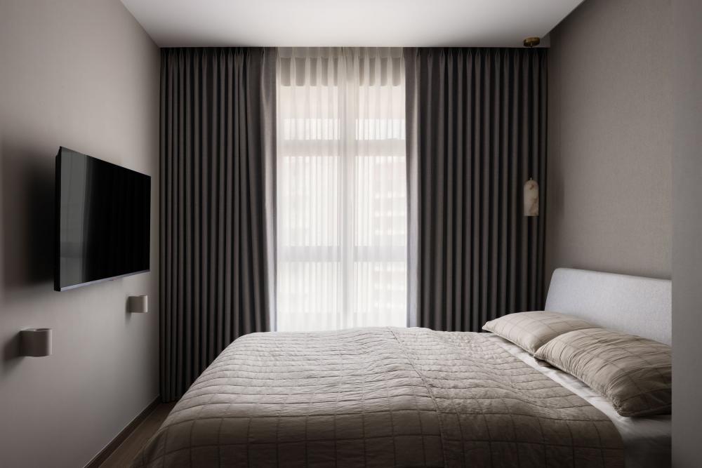 Contemporary Bedroom with Feature Wall and Drop Light