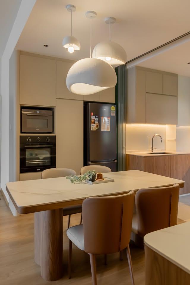 Modern Dining Room with Drop Light and Dining Table