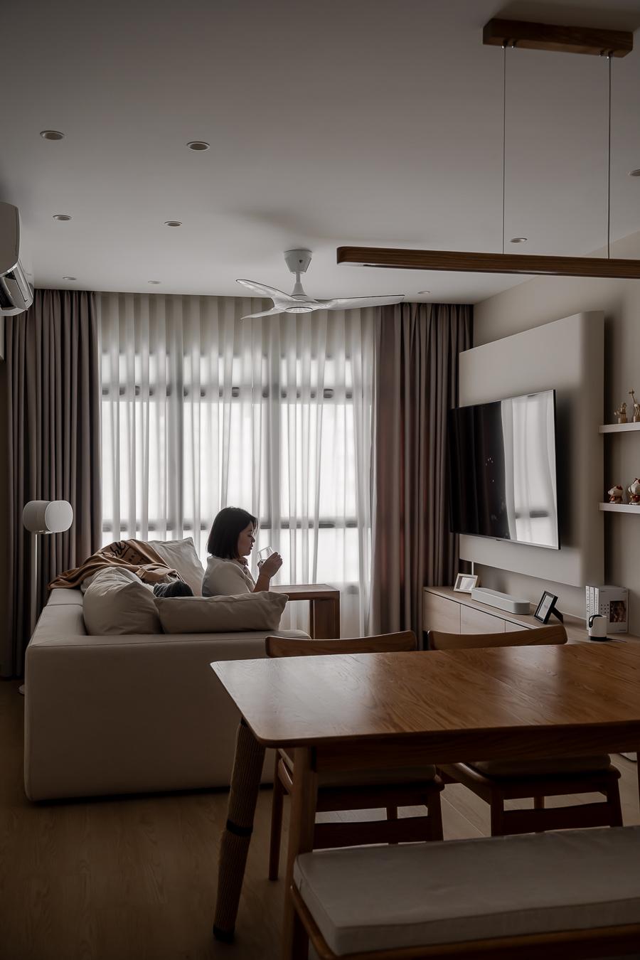 Scandinavian Living Room with Paintings and TV