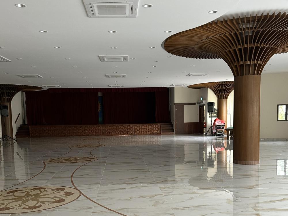 Transitional Living Room with Marble Floor and Feature Wall