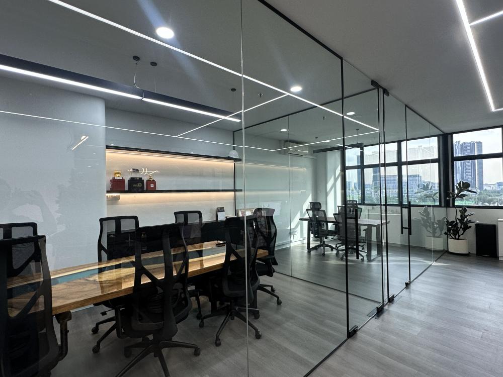 Modern Office with Bookshelf and Glass Door