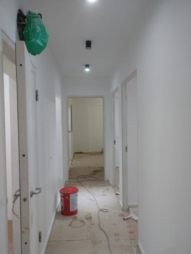 Asian Living Room with Homogeneous Tiles and Parquet Floor