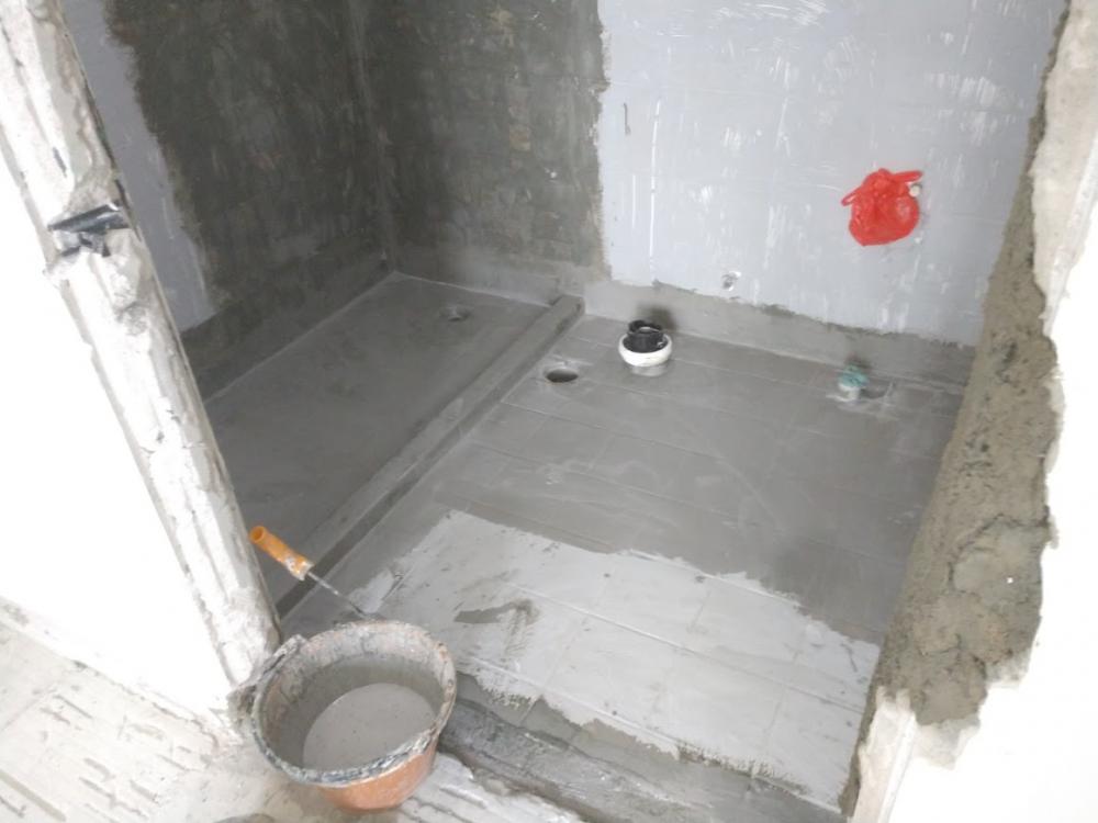 Asian Bathroom with Homogeneous Tiles and Mirror