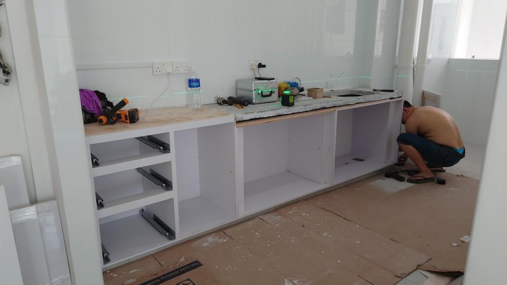 Asian Kitchen with Homogeneous Tiles and Open Kitchen