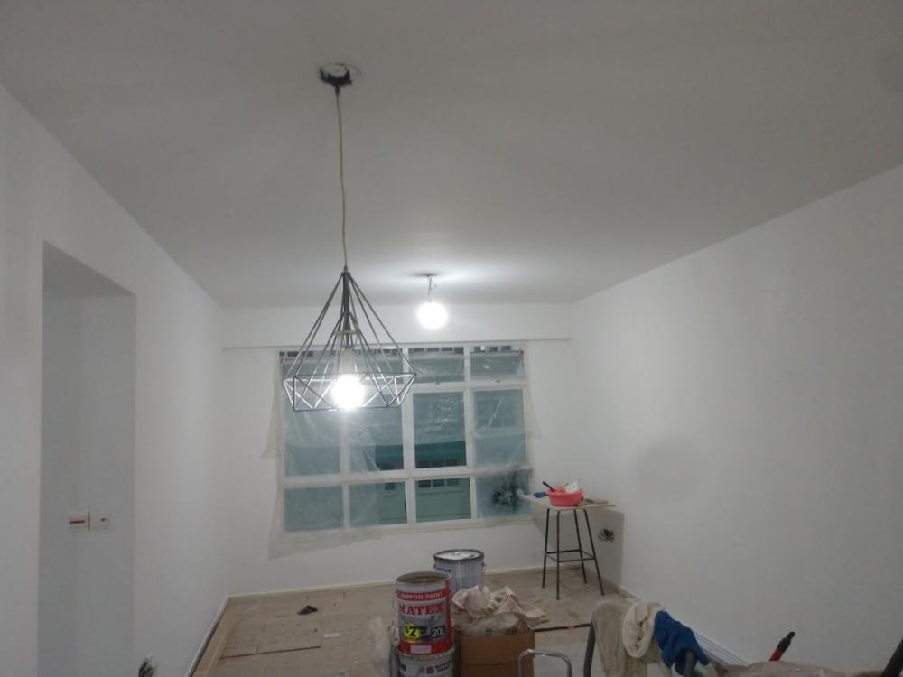 Asian Living Room with TV Console and Chandelier