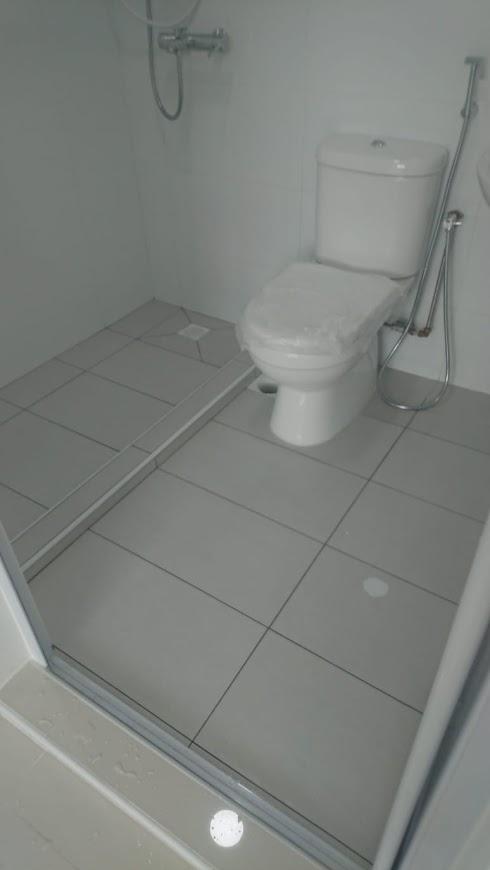 Asian Bathroom with Homogeneous Tiles and Bathroom Sinks