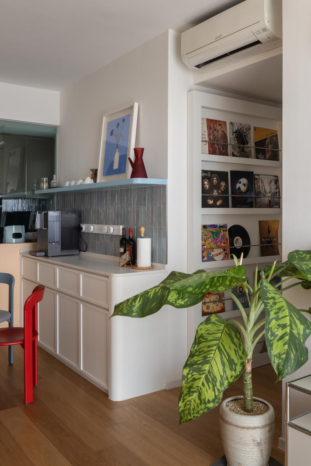 Eclectic Pantry with Wood Flooring and Storage Cabinets