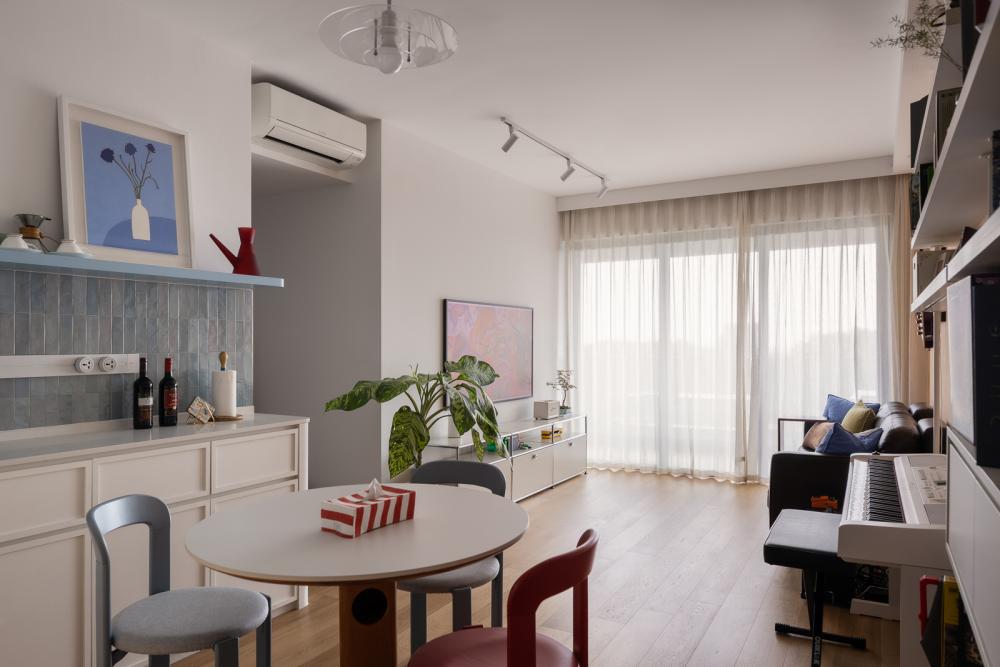 Eclectic Living Room with Wood Flooring and Curtain