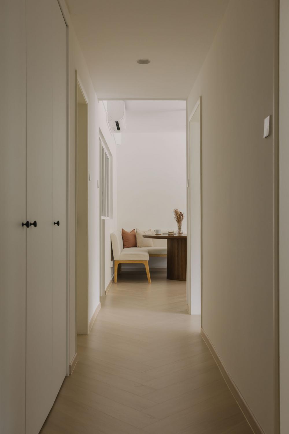 Country Hallway with Herringbone Tiling and Wood Flooring