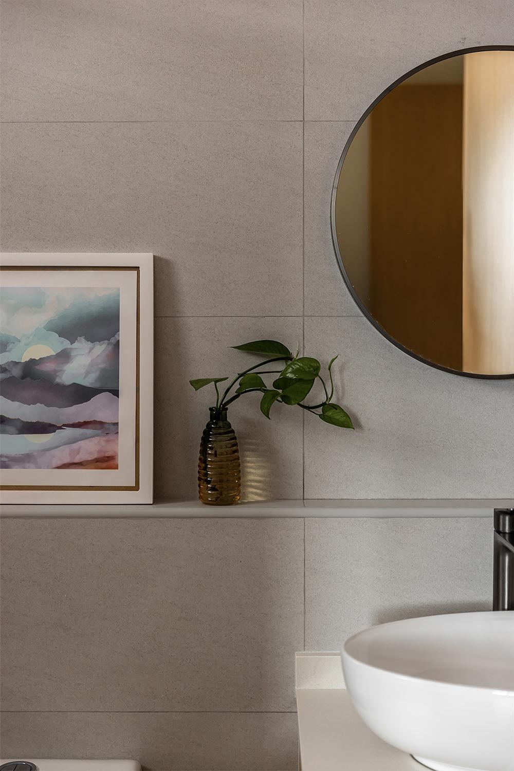Scandinavian Bathroom with Homogeneous Tiles and Artwork