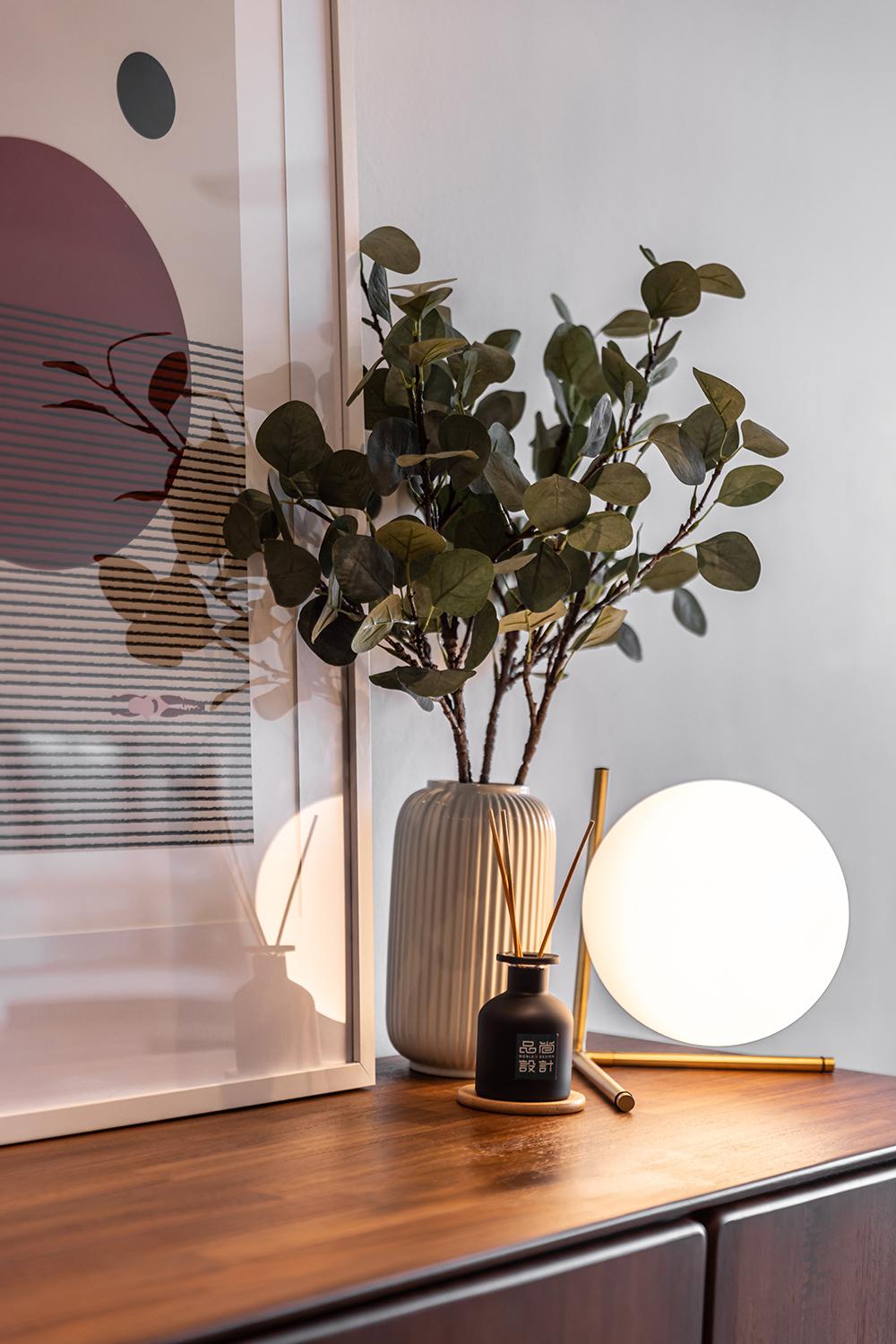 Scandinavian Foyer with Artwork and Planters