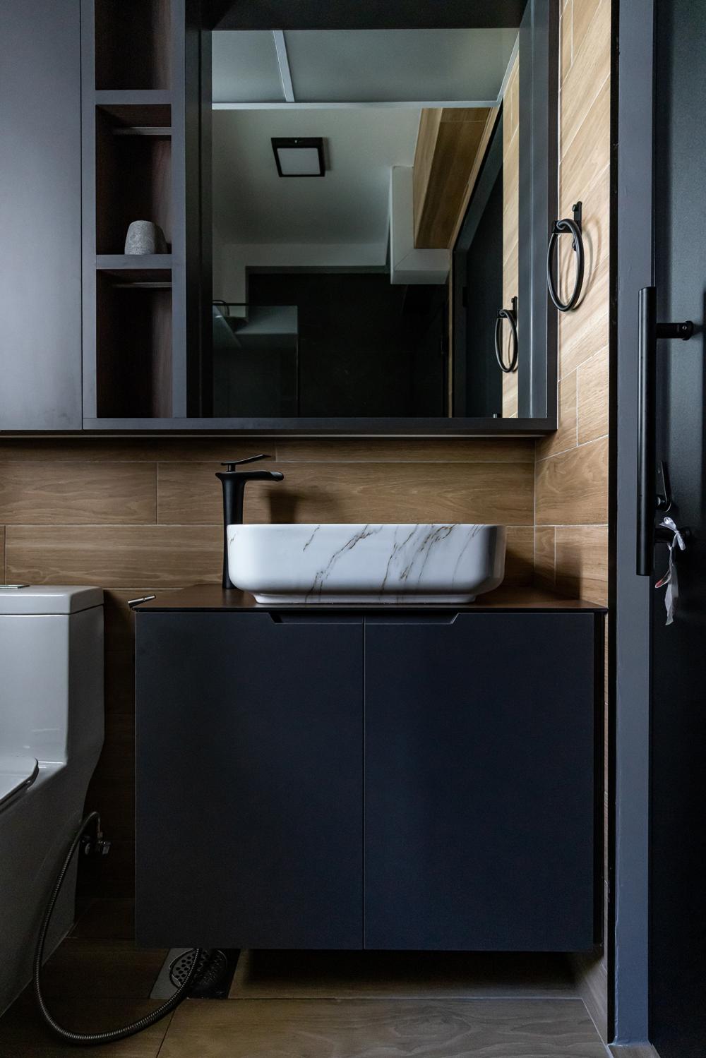 Industrial Bathroom with Countertop and Mirror