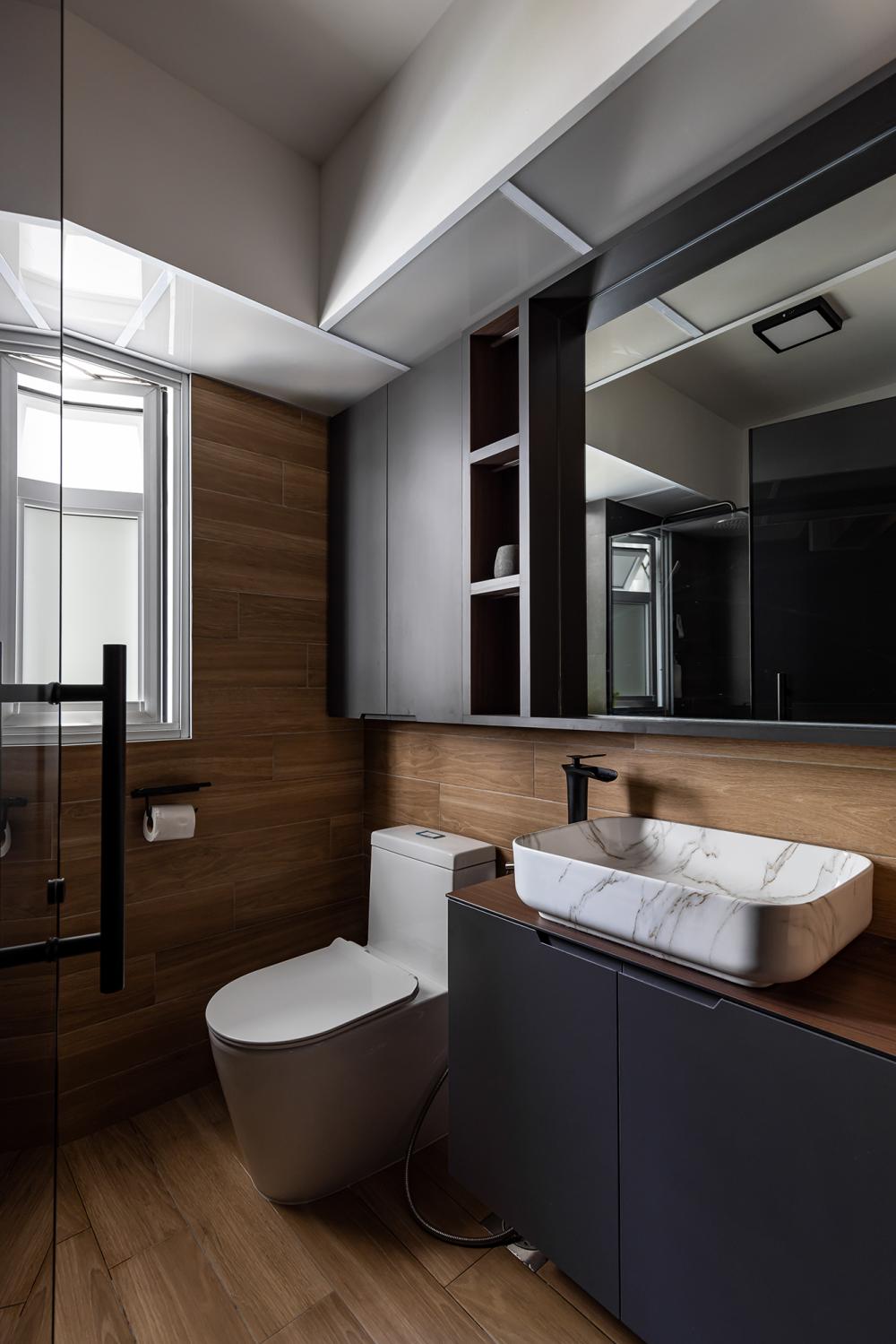 Industrial Bathroom with Homogeneous Tiles and Mirror