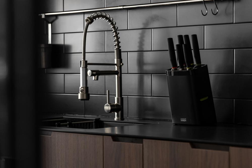 Industrial Kitchen with Homogeneous Tiles and Kitchen Backsplash