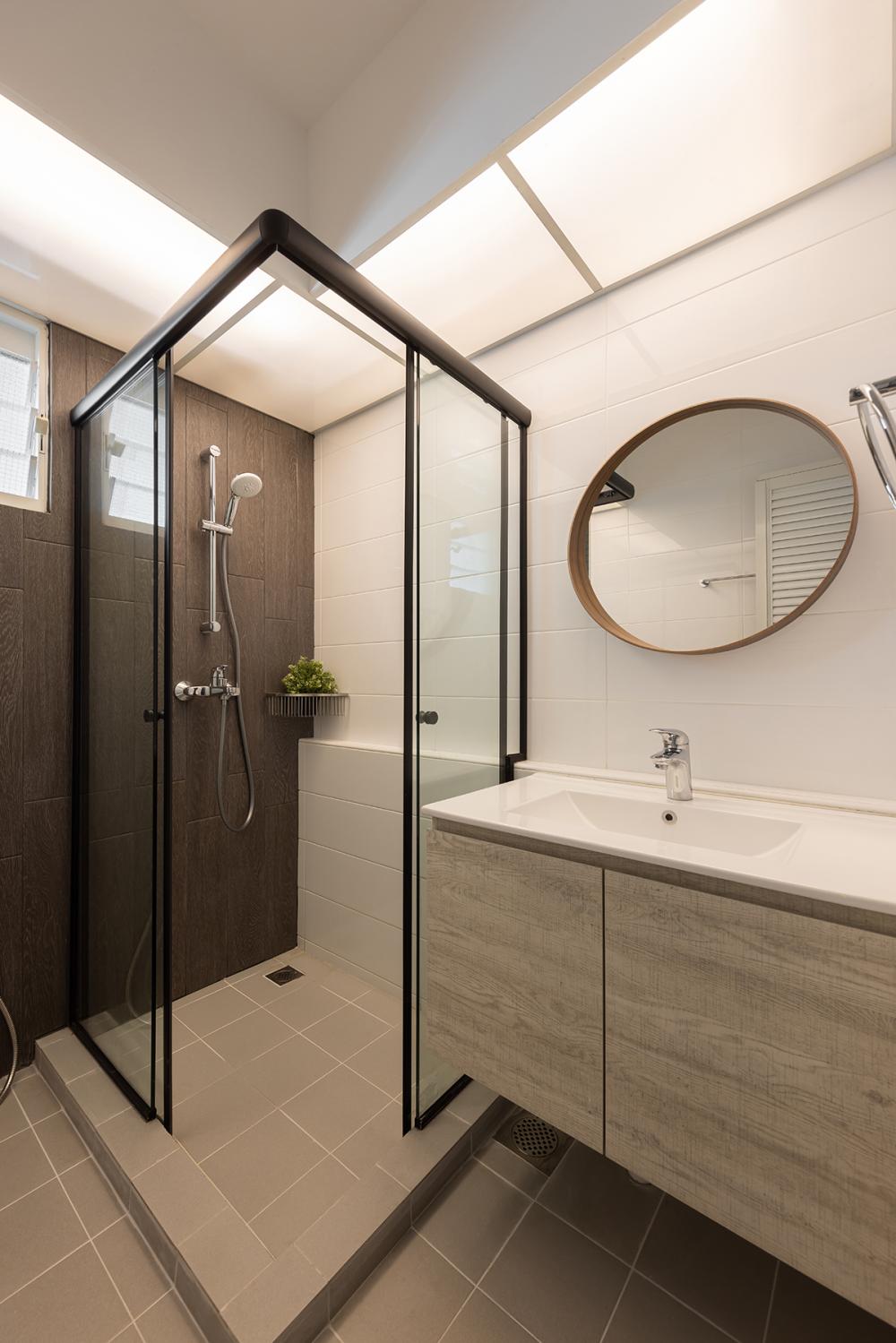 Modern Bathroom with Homogeneous Tiles and Mirror