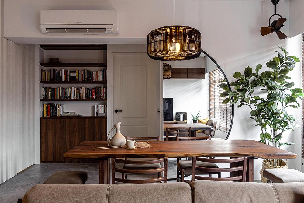 Scandinavian Dining Room with Bookshelf and Mirror