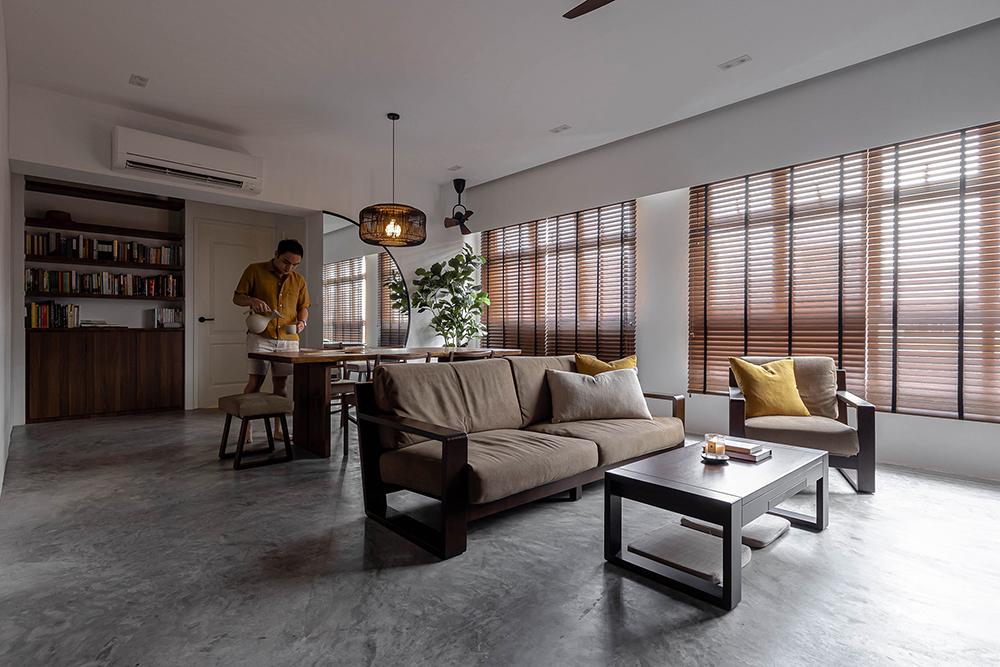 Scandinavian Living Room with Bookshelf and Cement Floor