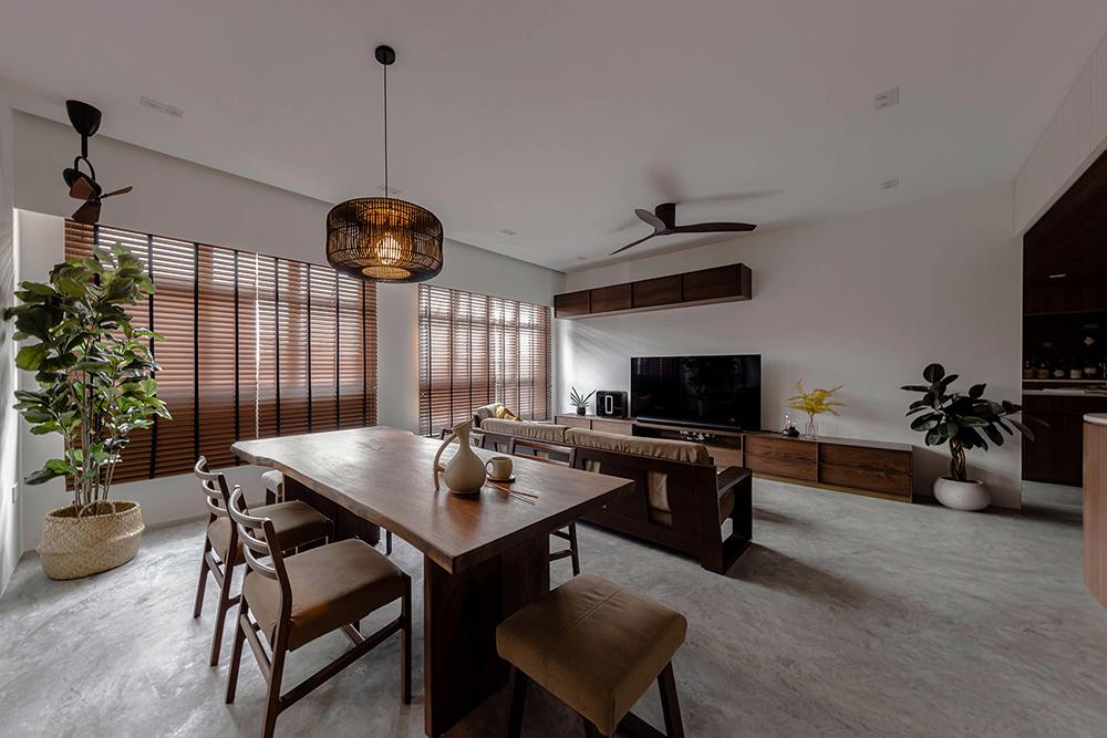 Scandinavian Living Room with Cement Floor and Dining Table