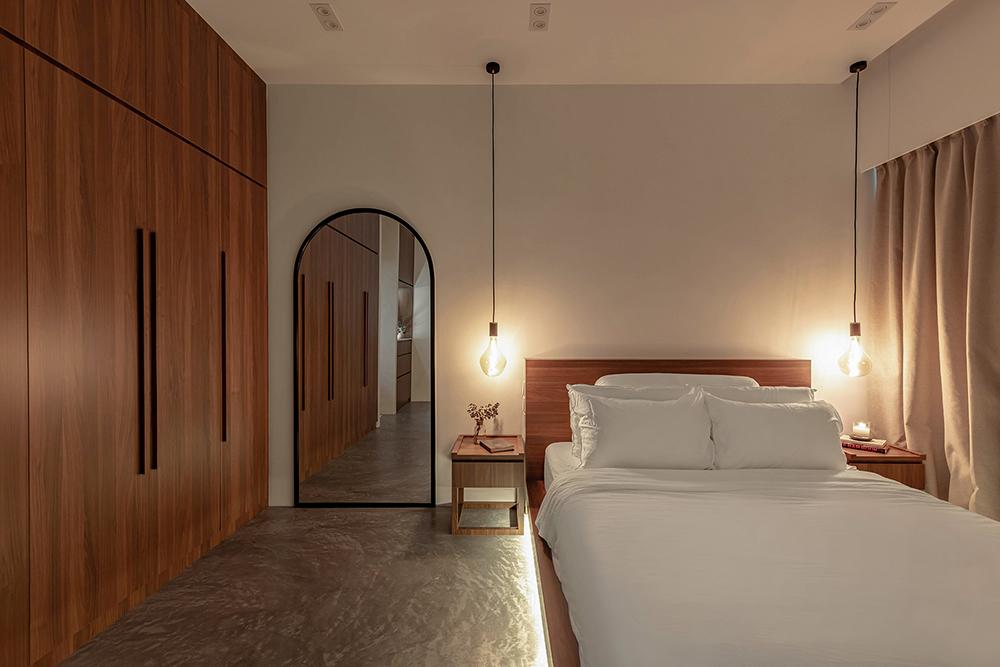 Scandinavian Bedroom with Cement Floor and Mirror
