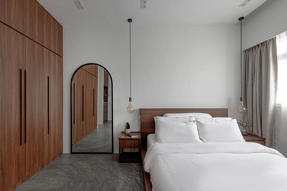 Scandinavian Bedroom with Cement Floor and Mirror