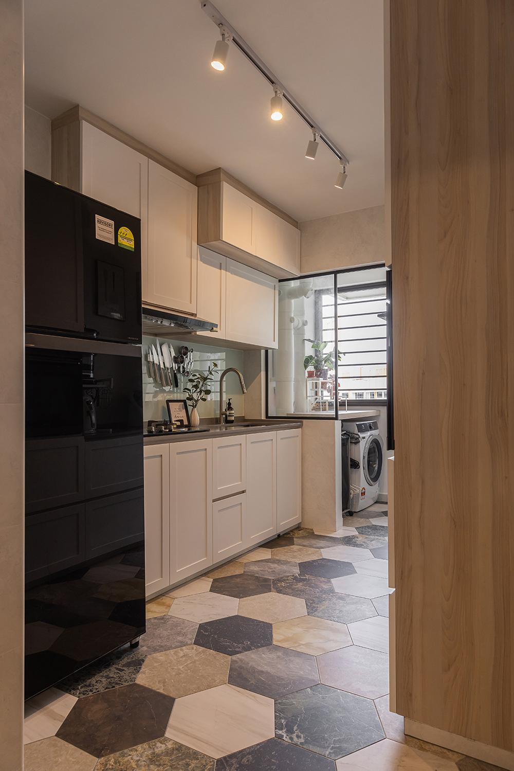 Industrial Kitchen with Homogeneous Tiles and Kitchen Accessories