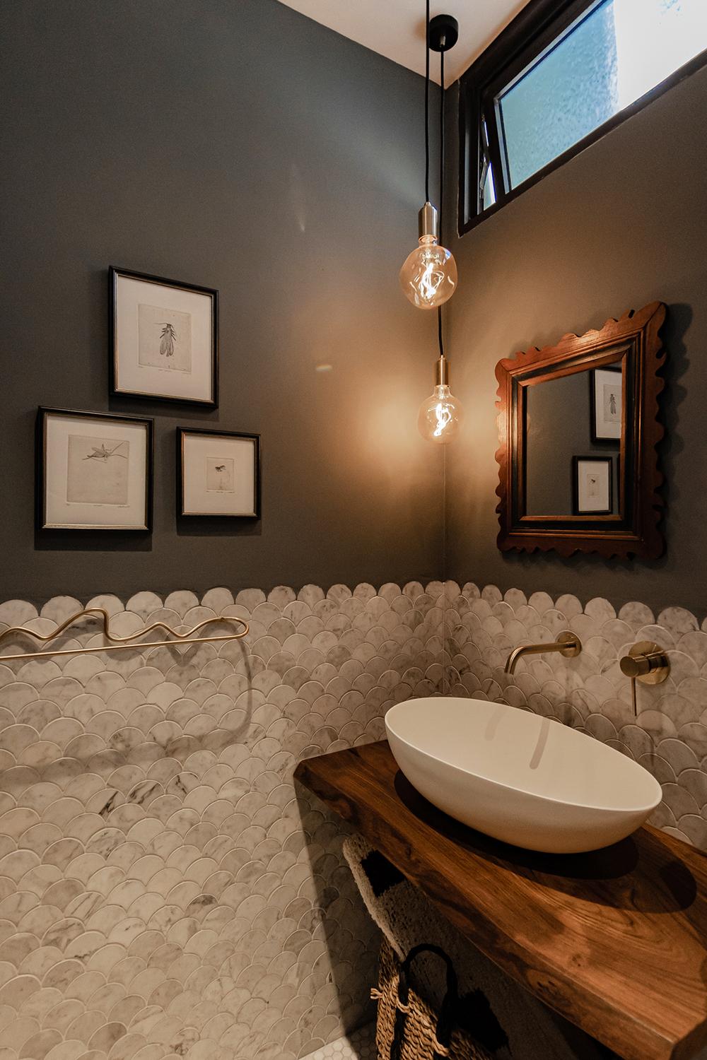 Eclectic Bathroom with Marble Floor and Mirror
