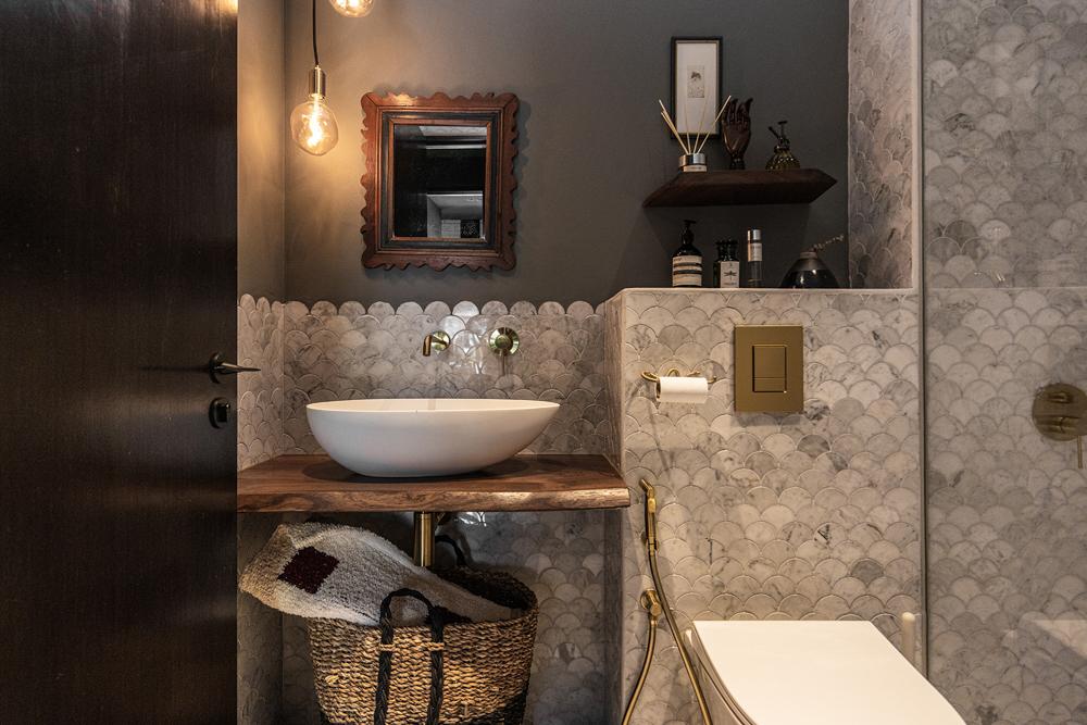 Eclectic Bathroom with Marble Floor and Mirror