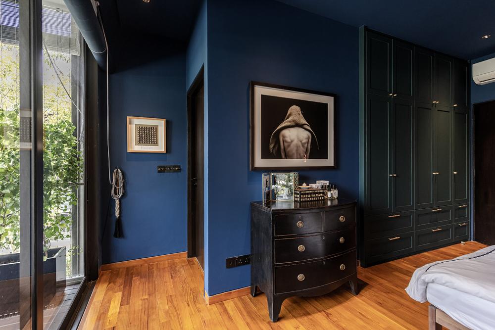 Eclectic Bedroom with Artwork and Wardrobe