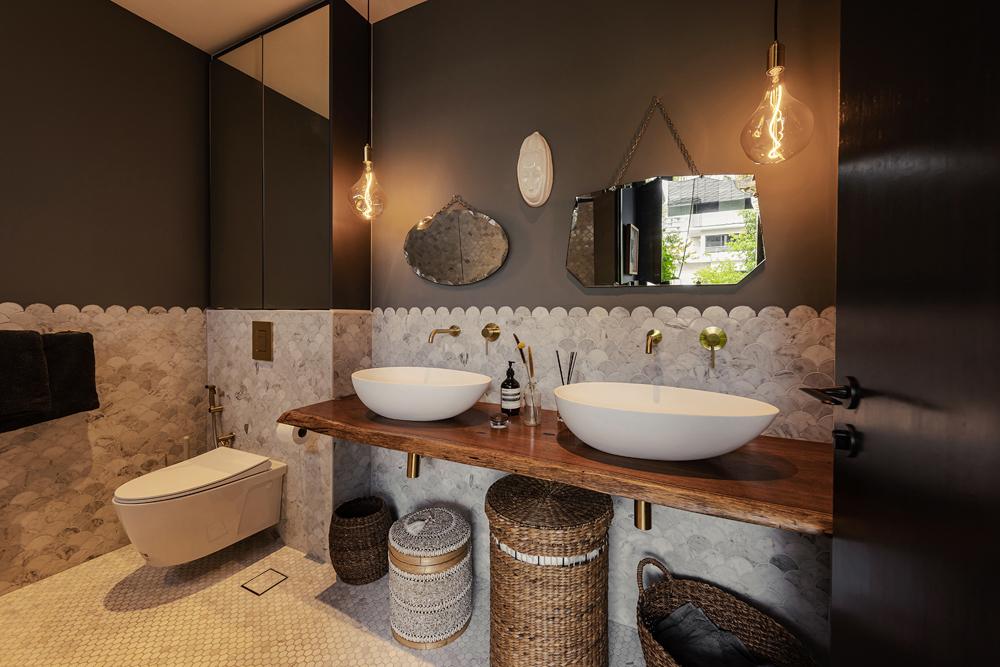 Eclectic Bathroom with Marble Floor and Mirror