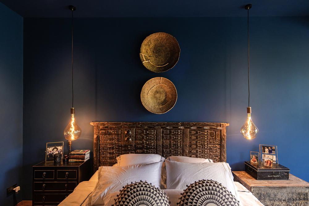Eclectic Bedroom with Artwork and Paintings