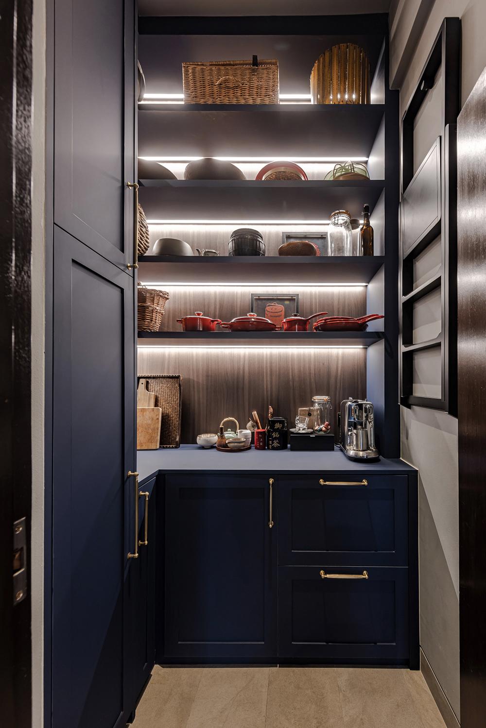 Eclectic Pantry with Drinkware and Storage Cabinets