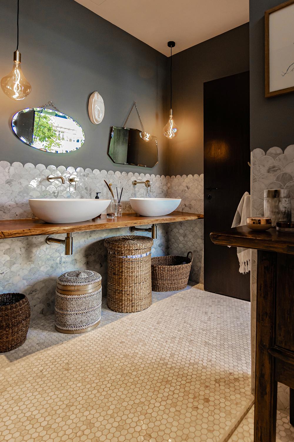 Eclectic Bathroom with Marble Floor and Mirror
