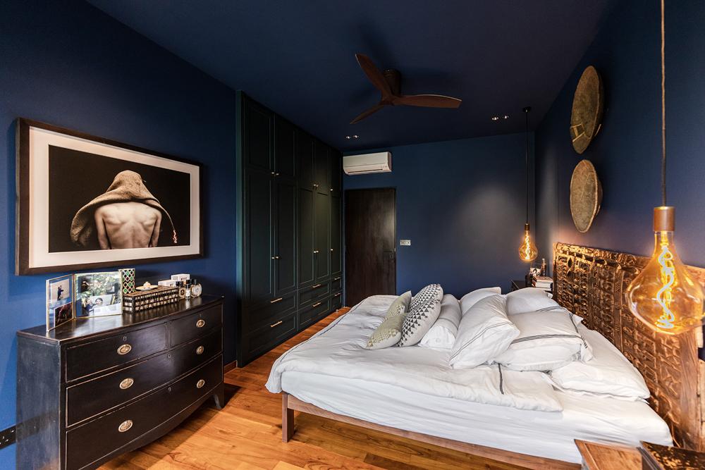 Eclectic Bedroom with Artwork and Wardrobe