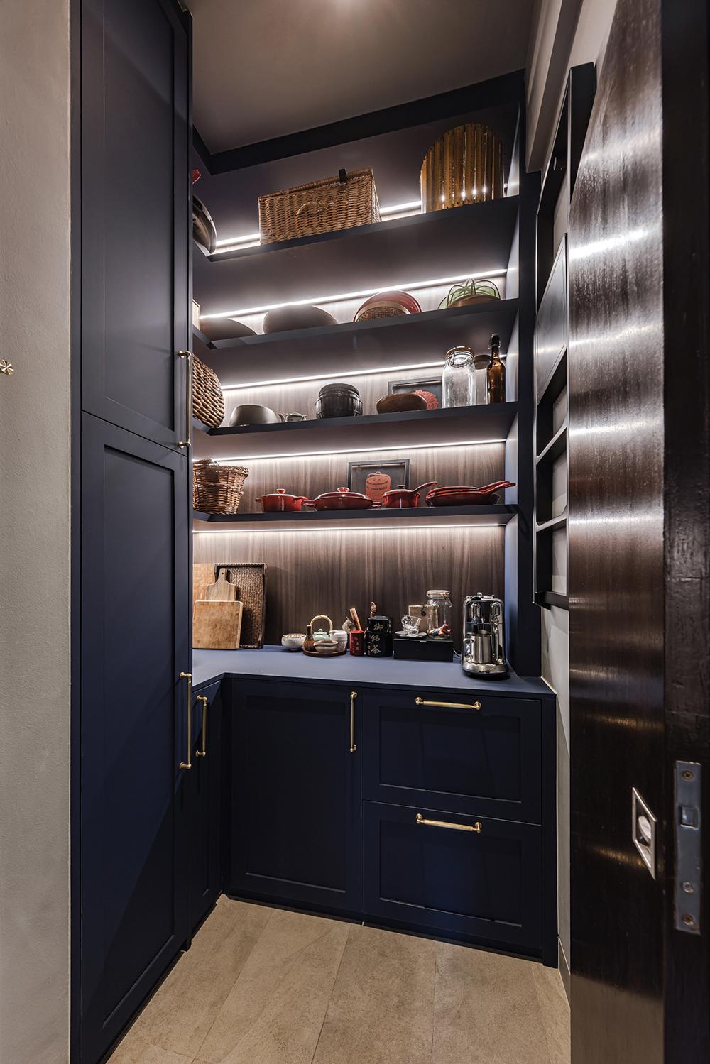Eclectic Pantry with Drinkware and Storage Cabinets