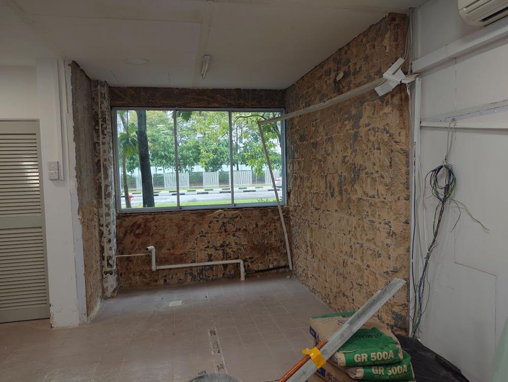 Asian Home Office with Bookshelf and Wallpaper
