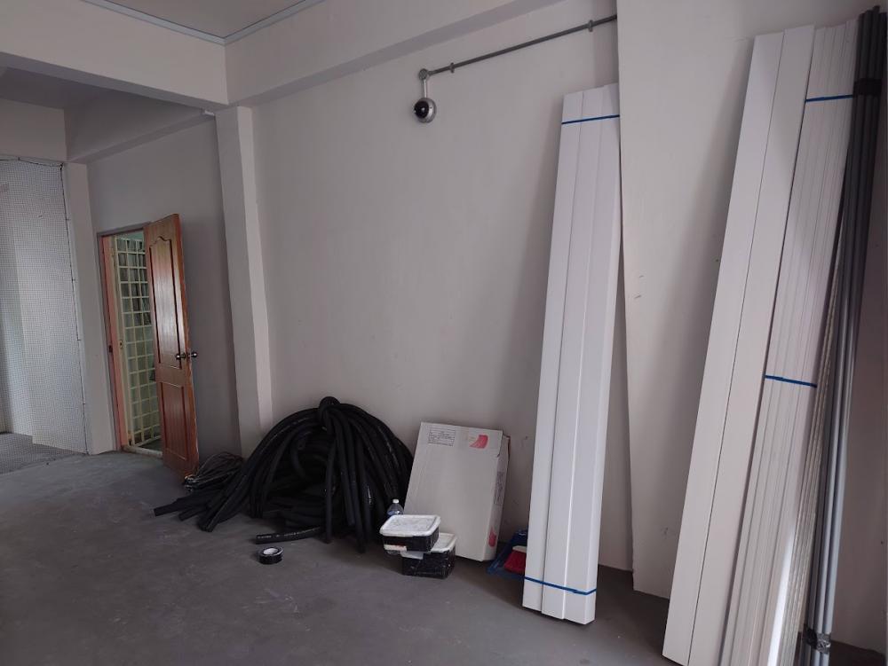 Asian Home Office with Bookshelf and Wallpaper