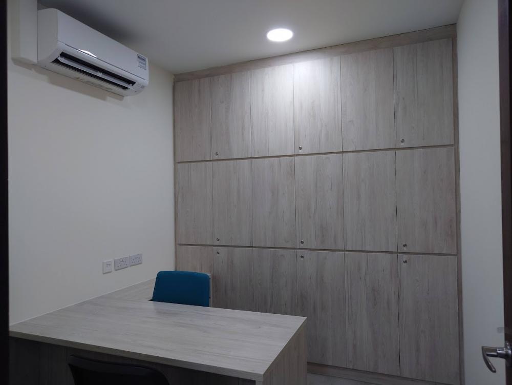 Asian Home Office with Wallpaper and Desk Chairs