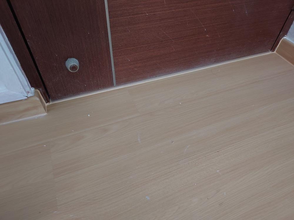 Asian Bedroom with Vinyl Flooring and Granite Floor