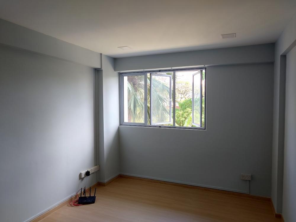 Asian Bedroom with Vinyl Flooring and Ceiling Light