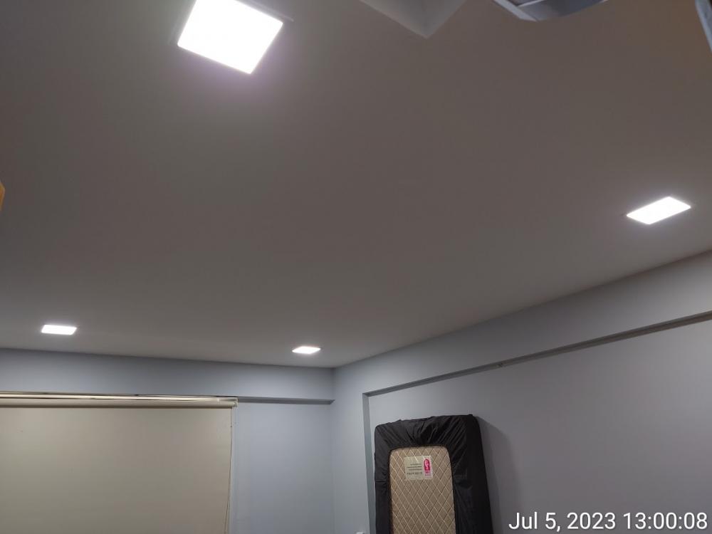 Asian Bedroom with Cove Lighting and Drop Ceiling