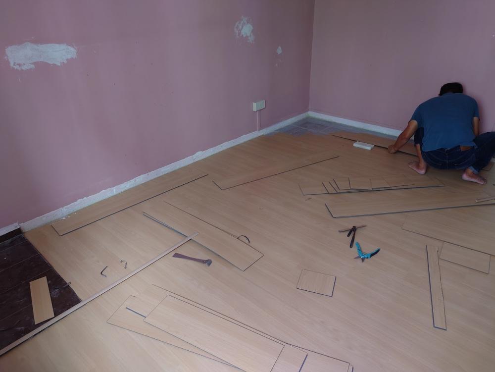 Asian Bedroom with Vinyl Flooring and Wood Flooring