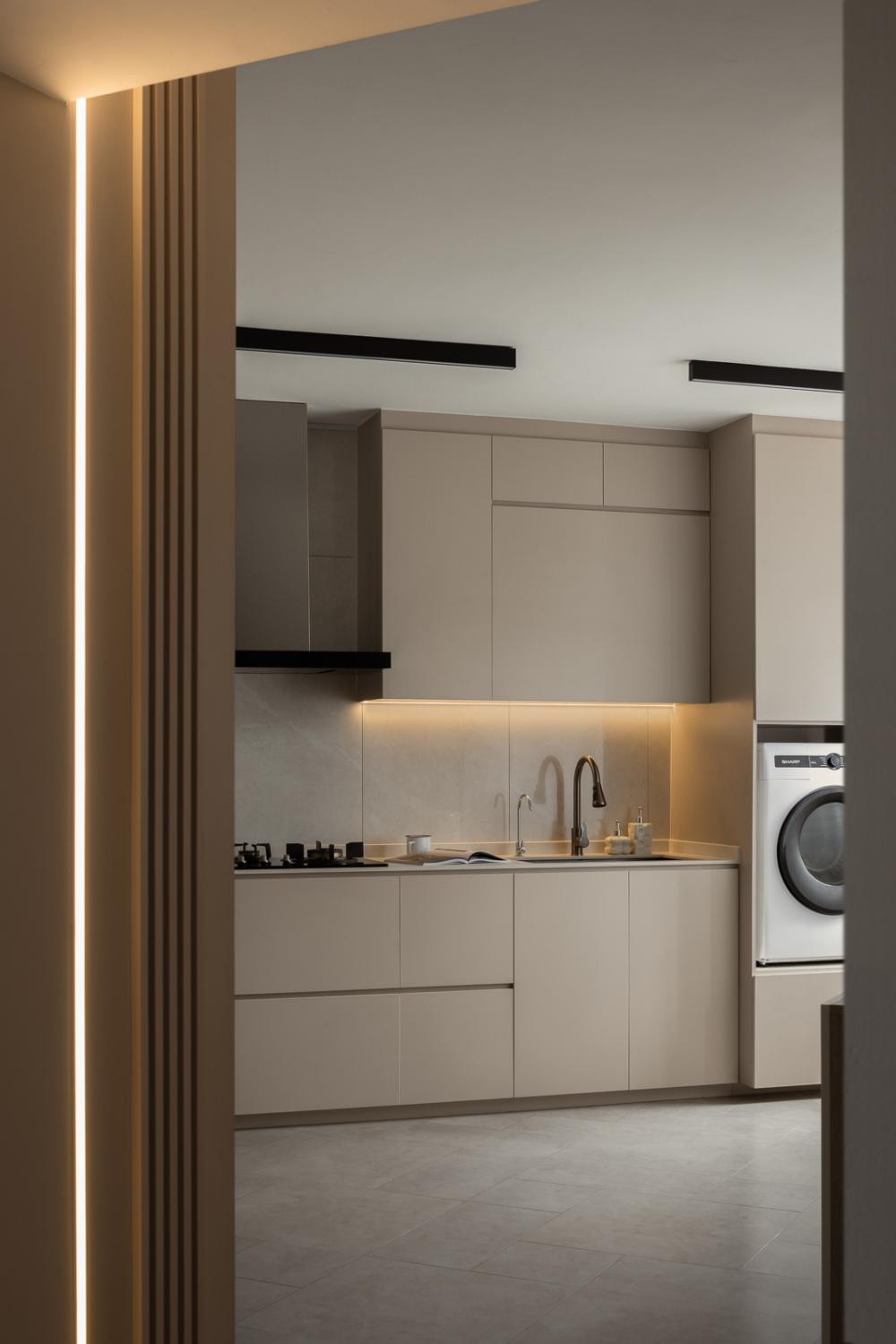 Modern Kitchen with Washing Machine and Cupboard