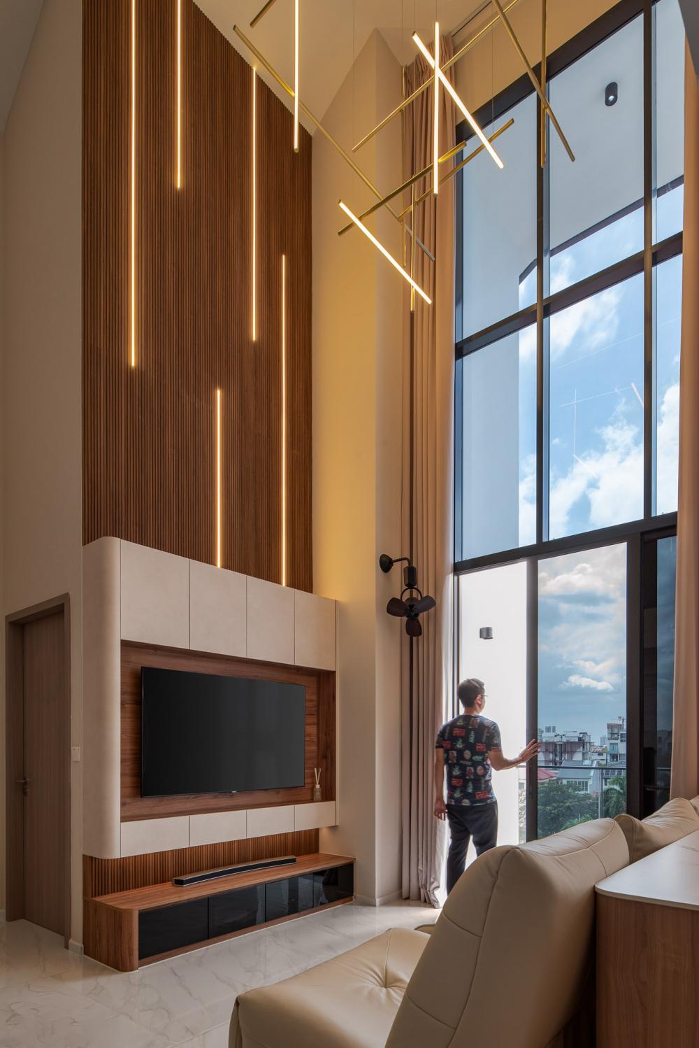 Modern Living Room with Homogeneous Tiles and TV Console